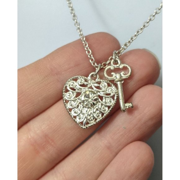Avon Jewelry - Silver Heart And Key Charm Necklace Stamped NWT/Avon